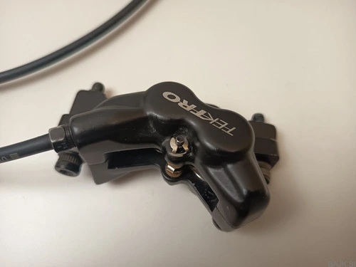 Zadnja zavora Tektro Orion 4p z zavorno ročico Shimano M4100