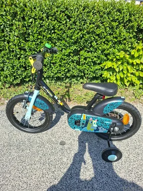 Otroško kolo Btwin 14 s pomožnimi kolesi