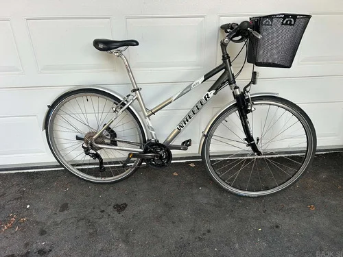 ŽENSKO ALUMINIJASTO TREKING KOLO S KOŠARO WHEELER, SHIMANO DEORE/XT 3x10 prest, KOMPLET POSERVISIRAN